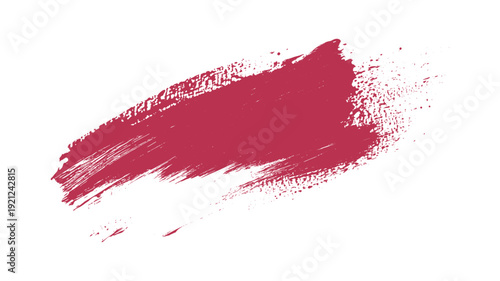Crimson red paint brush stroke with splatter effect on white background
