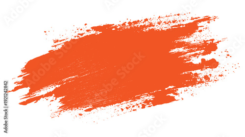 Bright orange paint splash with textured brush strokes and small splatter dots on a white background