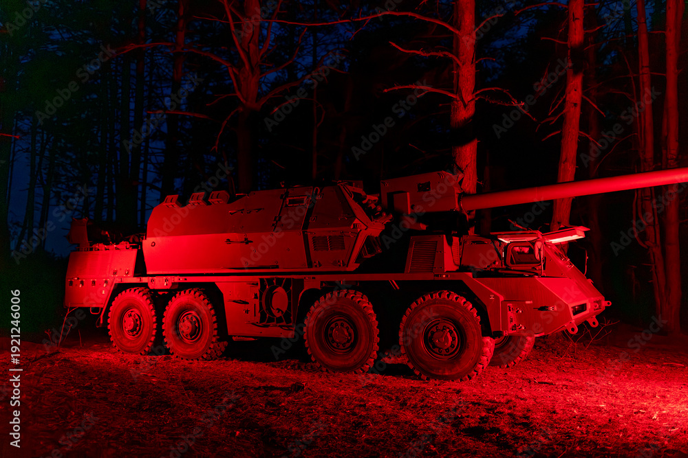 Obraz premium self-propelled artillery mount Suzanne in the forest. Military vehicle at night