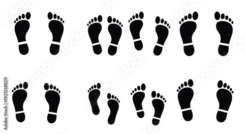 A series of black footprints arranged in rows a striking silhouette