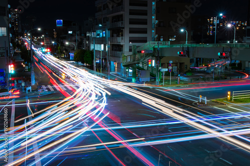 A night photography of traffic jam at the downtown crossing in Tokyo