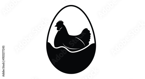 A black silhouette of a chicken hatching from an egg silhouette