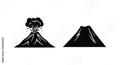 Volcanic eruption and mountain landscape in stark black silhouette