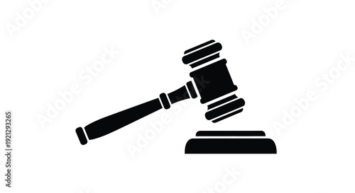 A black gavel resting on a sound block stark silhouette