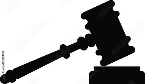 Black silhouette of a judge's gavel resting on its block justice court