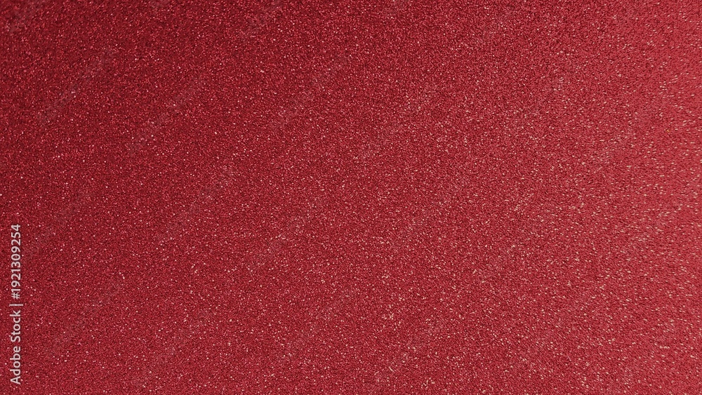 Fototapeta premium Sparkling red glitter shiny abstract texture background. Red shimmer surface with glowing sparkle particles. Luxury glitter glow backdrop.
