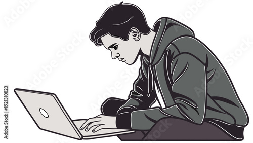 Young man intently focused on his laptop working or studying.