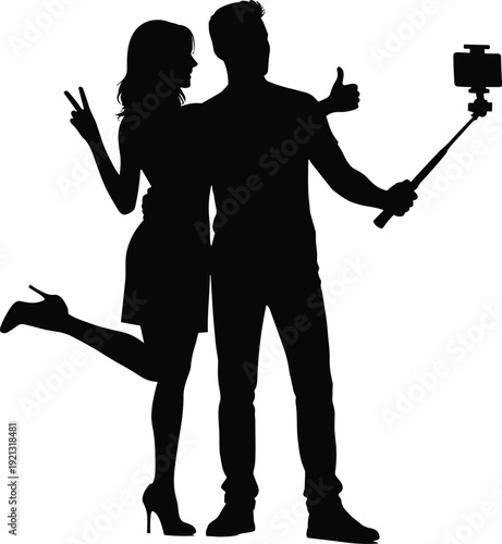 Silhouette of couple taking selfie with smartphone on stick