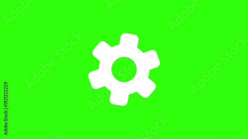 Animated white settings cog wheel icon on green screen background. Animation motion graphic with chroma green screen clip template. Free Footage Green Screen 4k. Free Video Green Screen 4k.