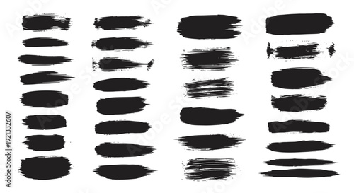 Collection of Black Paint Brush Strokes and Splatters on White Background