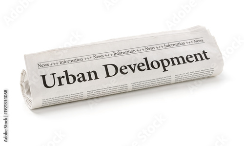Rolled newspaper with the headline Urban Development