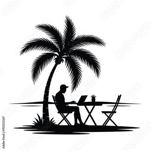 Silhouette of a man working on a laptop under a palm tree