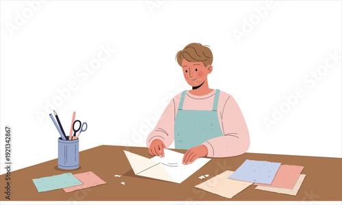 Handmade paper envelope crafting at the desk