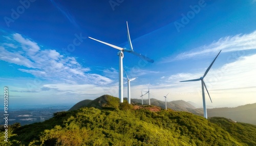 Wind Turbines on a Green Hill Under a Blue Sky.
