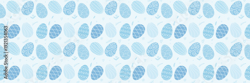 Seamless pastel Easter egg pattern on a soft blue background, perfect for spring wrapping paper, textiles, greeting cards, packaging, and seasonal surface designs.