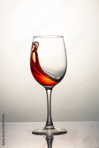 Red Wine Splash in Elegant Glass Isolated on White Background, Luxury Alcohol and Fine Dining Concept