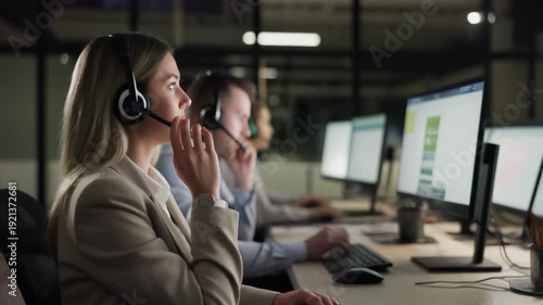 Call center agents working in a modern office
