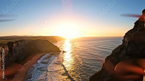 Coastal cliffs bathed in golden sunlight at sunrise, with gentle ocean waves lapping against the shore, highlighting the tranquility of the natural landscape