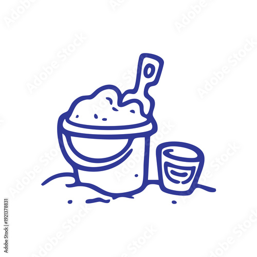 Sand Bucket and Spade on the Beach