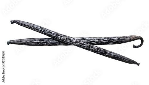 Two dark brown vanilla beans crossed on a black background