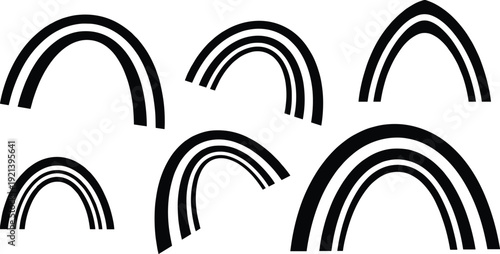 Black and white rainbow shapes in different sizes and orientations arches