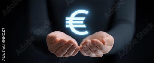 Wallpaper Mural Euro symbol dances above skilled hands showcasing online assets and investment opportunities in finance. Torontodigital.ca