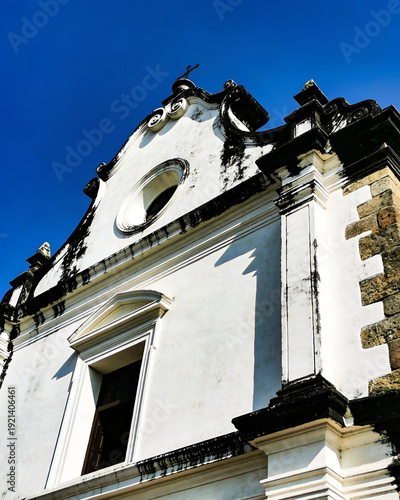 Portuguese colonial church facade with baroque details in Goa India
