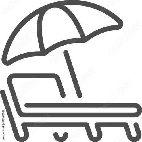 Beach umbrella and lounge chair waiting for relaxation