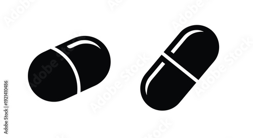 Two black capsule pills broken open depicted as a silhouette