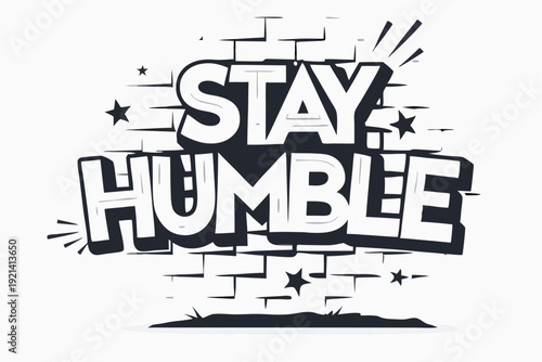 The white bold letters creatively say Stay Humble against a black and white backdrop