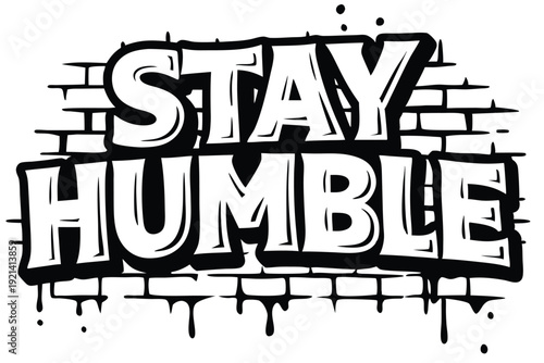 The white bold letters creatively say Stay Humble against a black and white backdrop