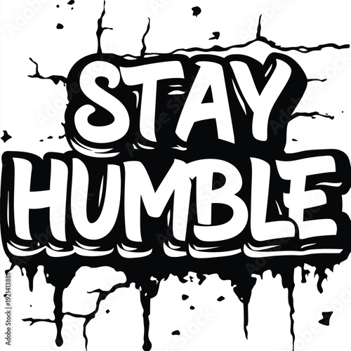 The white bold letters creatively say Stay Humble against a black and white backdrop