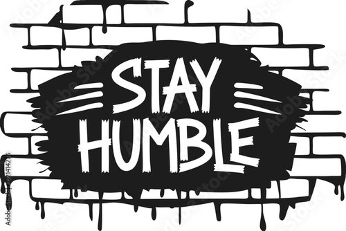 The white bold letters creatively say Stay Humble against a black and white backdrop