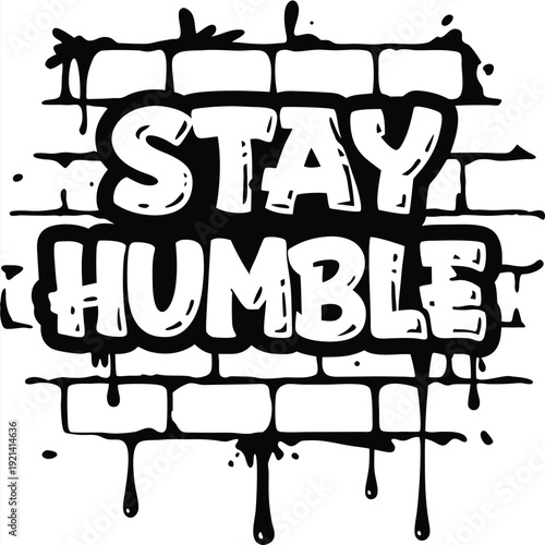 The white bold letters creatively say Stay Humble against a black and white backdrop