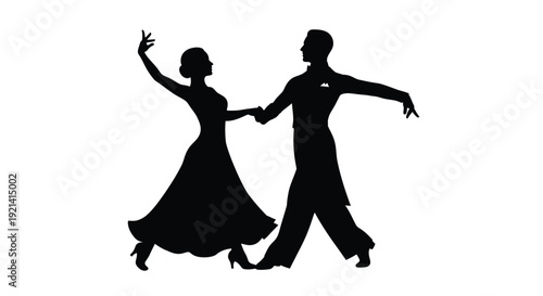 A couple elegantly dancing ballroom captured in a dramatic silhouette