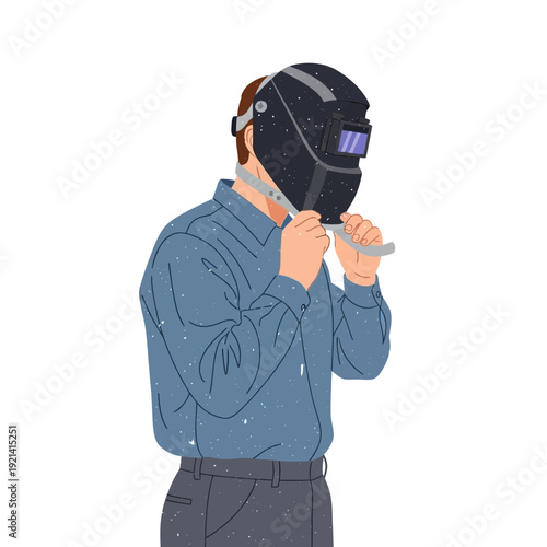 Welder preparing for work, adjusting safety helmet