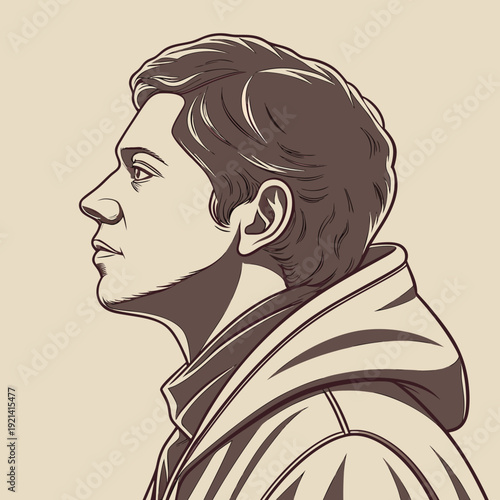 Profile of a young man in a hoodie looking forward.