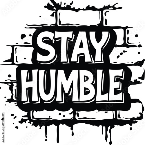 The white bold letters creatively say Stay Humble against a black and white backdrop