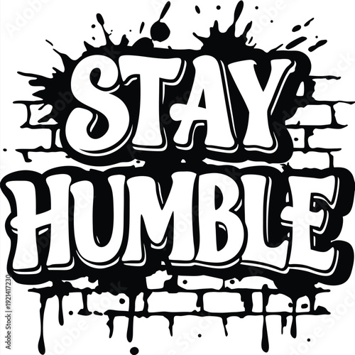 The white bold letters creatively say Stay Humble against a black and white backdrop
