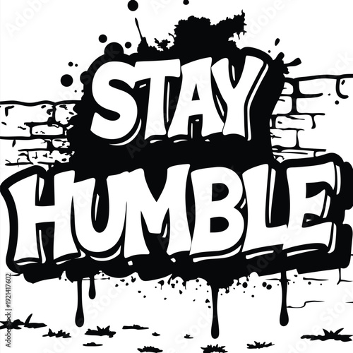 The white bold letters creatively say Stay Humble against a black and white backdrop