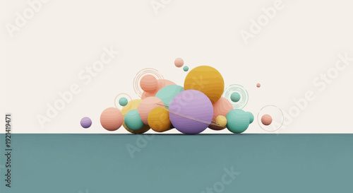 Colorful 3d spheres floating above a textured teal surface with a soft white background creating a playful and imaginative scene