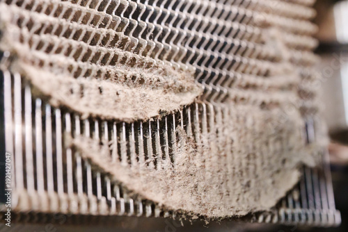 Dust buildup on a filter in a machine at a factory setting
