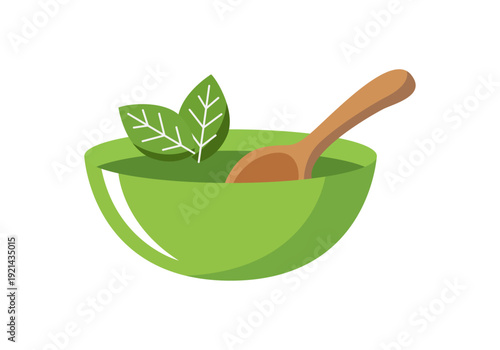 Tazón verde de sopa con una cuchara de madera y hojas frescas