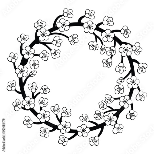 Delicate circular wreath of blossoming cherry branches in black and white