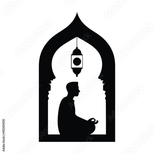 Silhouette of a man praying within an ornate islamic archway