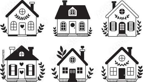 Collection of cozy black silhouette houses with wreaths and windows on transparent background