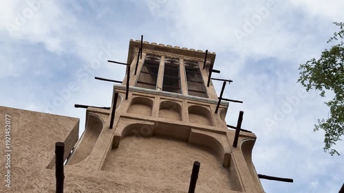 Low angle shot of traditional barjeel windtower with vents in Old Dubai, UAE
