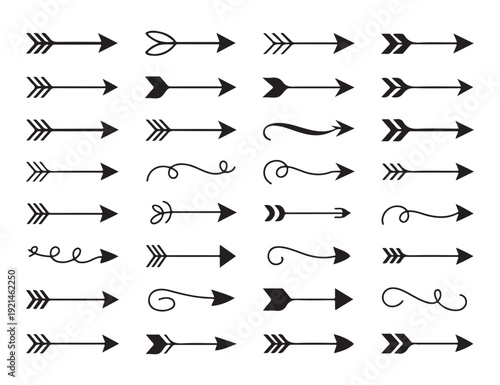 Vintage ethnic arrow icons with feather fletching and tribal decorative elements for artistic design