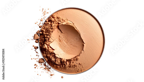 Circular compact of powder with a large swatch missing, viewed from above