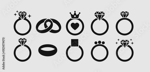 Black simple icon set of different ring styles with diamonds crowns hearts and bands